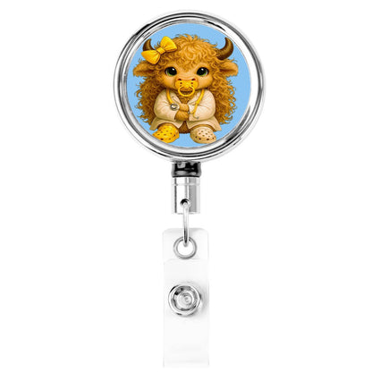 Baby Highland Cow Badge Reel – Yellow Bow Cutie Edition